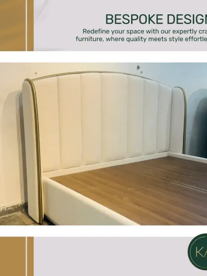 A minimalist bed design with a simple, arched headboard outlined in a delicate gold-finish trim. This piece is a perfect example of understated luxury, where clean lines and subtle details create a sophisticated look.