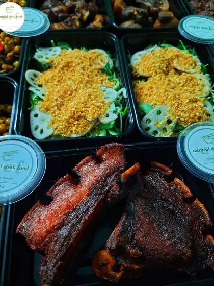 A close-up of the smoked pork ribs and fried singju that were part of our international delivery to the Maldives.