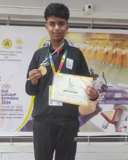 Smayan proudly displays his gold medal from the Mini Olympic Games, an event organized by the Karnataka Olympic Association. It's inspiring to see our young shooters excel in prestigious competitions.