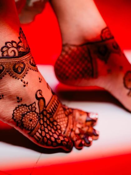 An artistic shot of the peacock feet mehendi, highlighting the clean lines and intricate details.