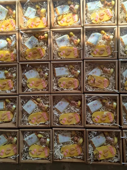 A large order of the yellow-themed baby shower gift boxes, showing my capacity for bulk orders.