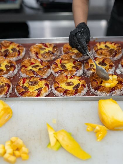 The final touches being added during our corporate workshop. We train teams to produce beautiful, consistent, and high-quality pastries suitable for a five-star hotel environment.
