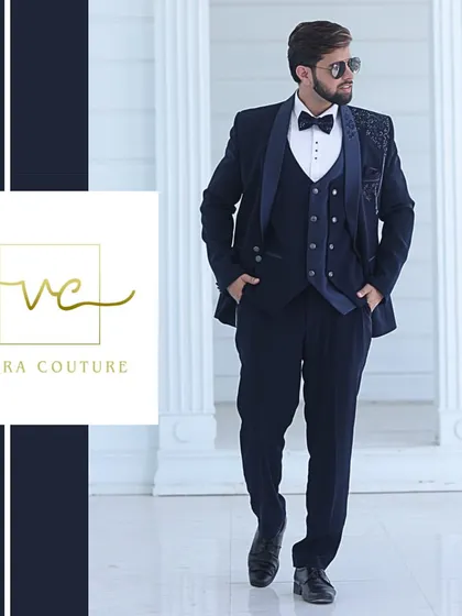 A professionally styled shot of our navy blue tuxedo, showing how it can be worn for a high-fashion look. We work with you to create a complete ensemble that reflects your personal style.