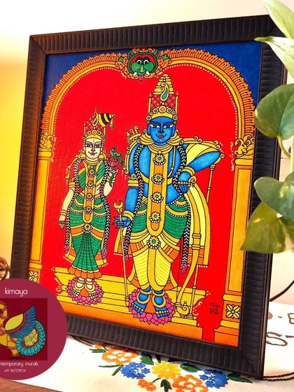 This Aandal Rangamannar painting, beautifully framed and ready to be gifted. The rich red background makes the divine figures stand out, making it a perfect, heartfelt 25th-anniversary gift for a wonderful couple.