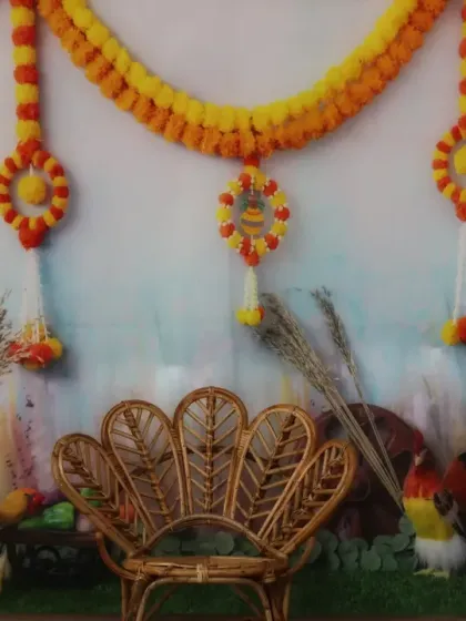 A vibrant and colorful theme for traditional celebrations, featuring marigold garlands and ethnic decor, ideal for baby photoshoots or festive family pictures.