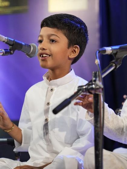 This young vocalist smiles as he sings, embodying the joy we strive to instill in our students.