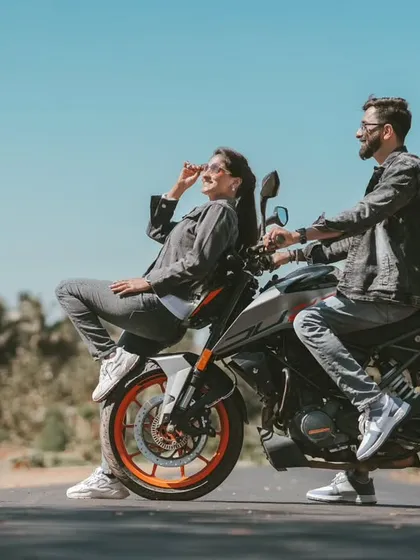 A playful and cool pose on a sports bike. We love incorporating your hobbies and passions into the photoshoot.