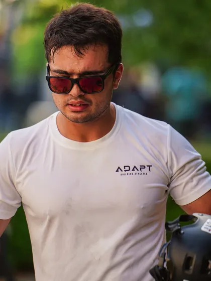 A close-up shot during the cycling leg. The intensity is written on my face. You have to stay in the zone.