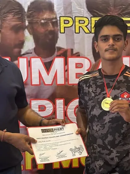 Amey, another one of our gold medalists, after his second-round TKO victory. Our fighters dominate in every discipline, from grappling to kickboxing.