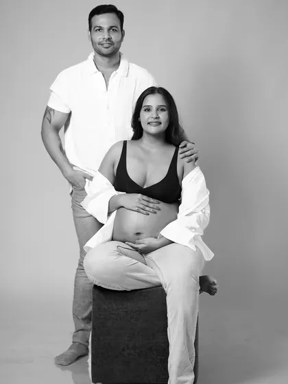 Sometimes, the most powerful images are the simplest. This black and white couple portrait, styled with casual white shirts and jeans, focuses on the raw emotion and connection, creating a timeless and modern memory.