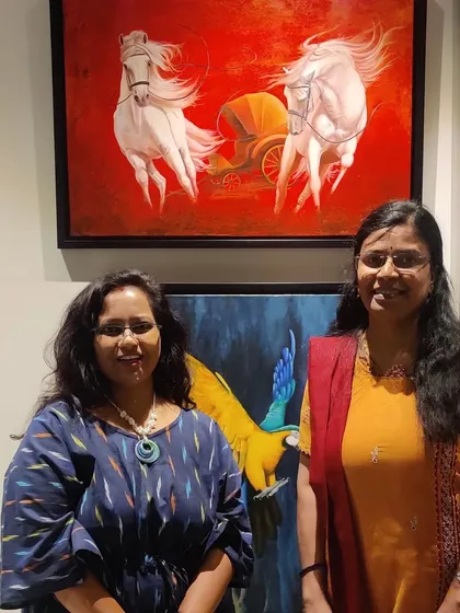 With a fellow artist at the Canvas Art Gallery.