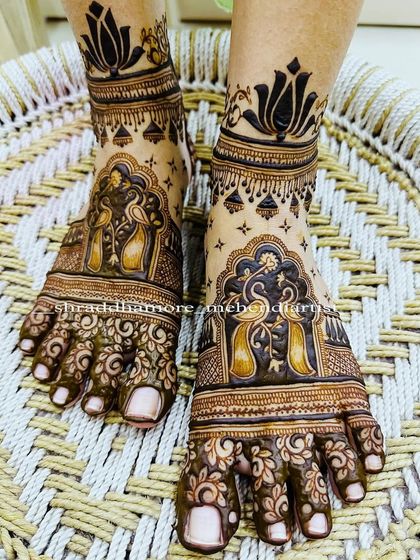 The traditional peacock feet design, beautifully captured on a rustic woven stool.