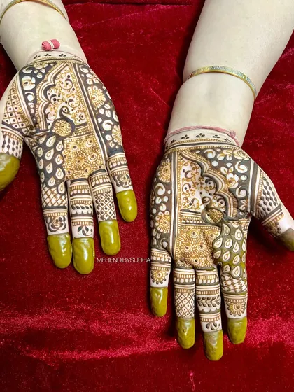 A lovely design featuring a peacock within a paisley shape. The use of dark-filled areas creates a beautiful contrast.