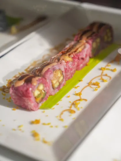 A colourful and creative sushi roll, showcasing our innovative approach to Japanese cuisine. The presentation is as delightful as the flavour.