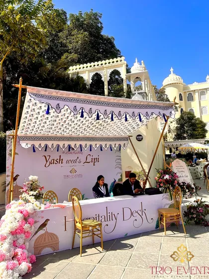 The first point of contact for your guests is the hospitality desk. I design these to be warm, welcoming, and in line with the wedding's theme, ensuring a smooth and elegant check-in experience.
