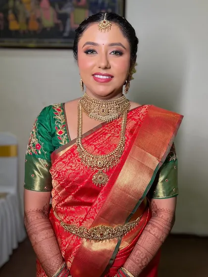 Another beautiful portrait of Pooja, capturing the essence of her divine bridal look.