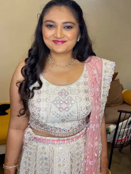 Tiana looking confident and beautiful. This is a perfect example of a modern party makeup look that's both glamorous and fresh.
