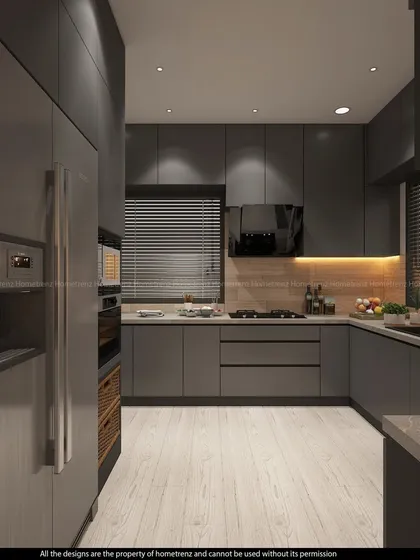 A dark and moody kitchen design. The matte grey cabinets, wood-textured backsplash, and under-cabinet lighting create a sophisticated and high-end look.
