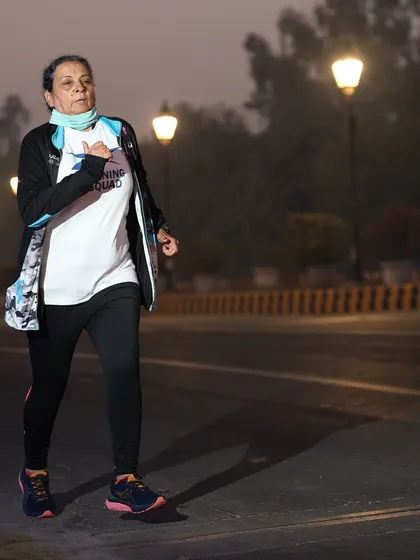 An athlete bundled up for a cold morning run. We train year-round, in all conditions.