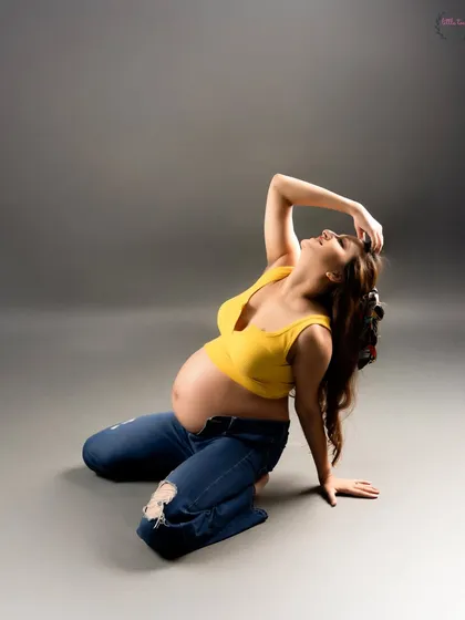 A more dynamic pose from the same casual shoot, capturing a moment of joy and freedom.