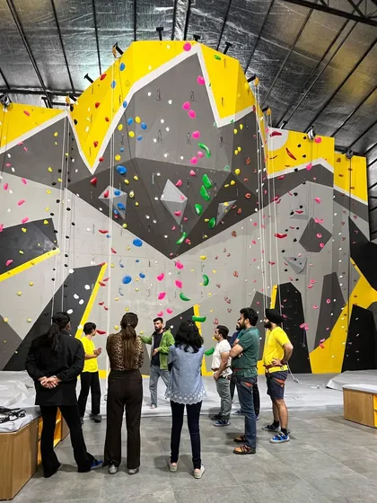 Welcome to your new favorite hangout. I give a quick safety briefing before every session to make sure everyone knows the ropes. With over 100 different routes, there's a challenge waiting for every skill level.