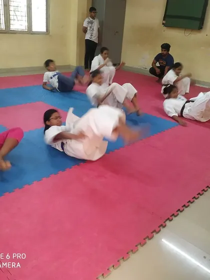 Core strength is essential for powerful techniques. Our kids' classes include conditioning exercises to build a strong physical base for their karate training.