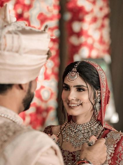 The way they look at each other is just pure love. A beautiful candid moment between the bride and groom.