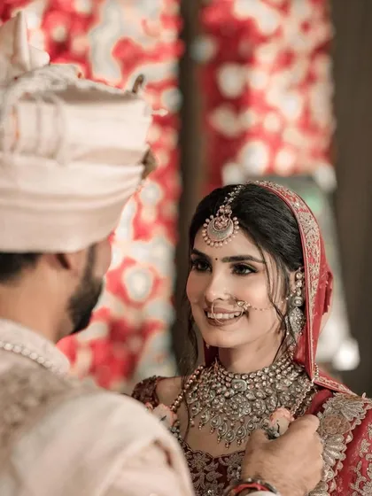 The way they look at each other is just pure love. A beautiful candid moment between the bride and groom.