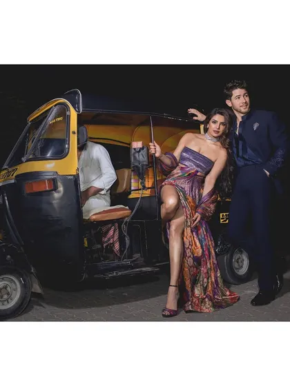 A styled portrait of Priyanka Chopra and Nick Jonas with a classic Mumbai auto-rickshaw. This shot was about creating a narrative that felt both glamorous and grounded, a fusion of Hollywood style and Indian street culture.