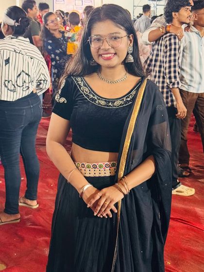 This black ghagra is a versatile piece that can be styled in many ways for Navratri. It's elegant and comfortable.