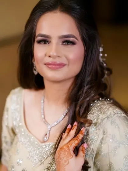 A close-up of a beautiful Sangeet look. I focused on creating a luminous complexion and enhancing her eyes with soft, blended eyeshadow and full lashes, ensuring she looks flawless from every angle.
