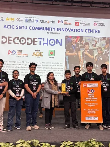 Team Metal Mavericks on stage receiving their award at the North India regional championship. As a rookie team, their journey to the finals was an incredible achievement.