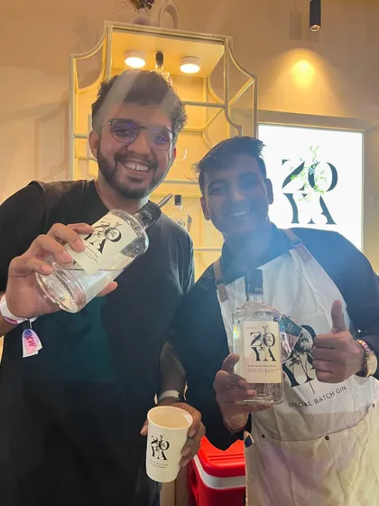 Posing with a fellow professional and a bottle of Zoya Gin. Collaborating with great brands and people is a highlight of my work.