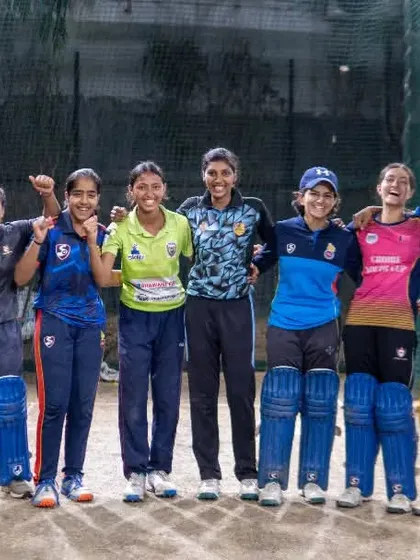 This is what our cricket family looks like. A group of our dedicated players sharing a moment of camaraderie after a tough training session in the nets. We believe a supportive team environment is just as important as the drills.