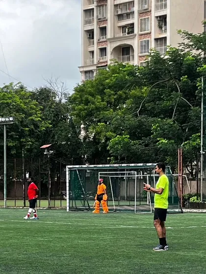 A practice session with senior and junior players, with a focus on goalkeeping. Here, I'm observing the keeper's positioning and communication with the defense.