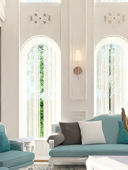 This living space showcases my approach to classical design, incorporating grand columns, arched windows, and intricate wall moldings to create a timeless and comfortable room.
