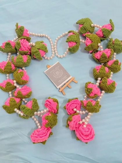 For a truly unforgettable wedding, I craft these everlasting varmala garlands. Made from crochet flowers and pearls, they are a beautiful, reusable keepsake that symbolizes love that never fades.