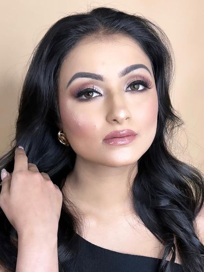 A close-up of the finished look from the transformation video, showcasing the dewy skin and beautifully blended eyeshadow.