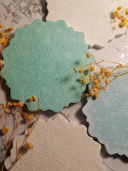 The full set of pastel Mandala coasters, ready to be used. The different colors allow you to mix and match depending on your mood or decor.