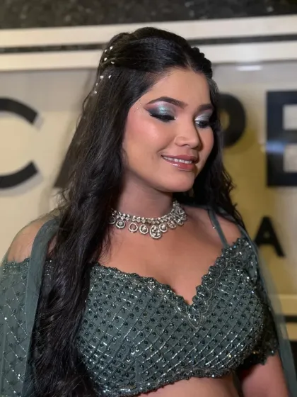 This image captures the shimmer and dimension of the silver and black smokey eye. It's a classic choice for an evening event that always looks stunning.