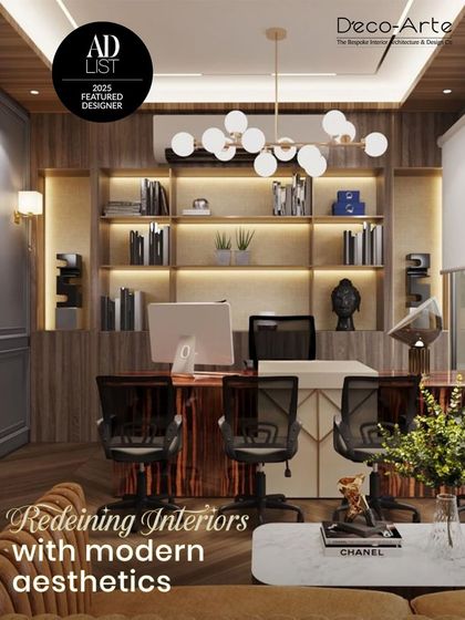 Redefining interiors with modern aesthetics. This office space is a perfect balance of sophistication and functionality, featuring warm wood, metallic accents, and statement lighting for a productive environment.