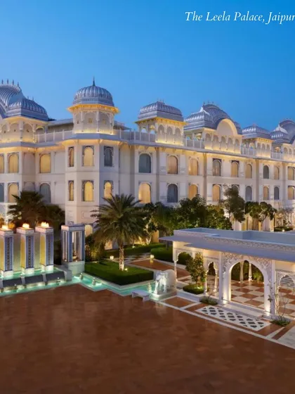 The Leela Palace in Jaipur, a stunning example of modern palace architecture. Its pristine white facade and beautiful courtyards are perfect for a regal and elegant wedding.