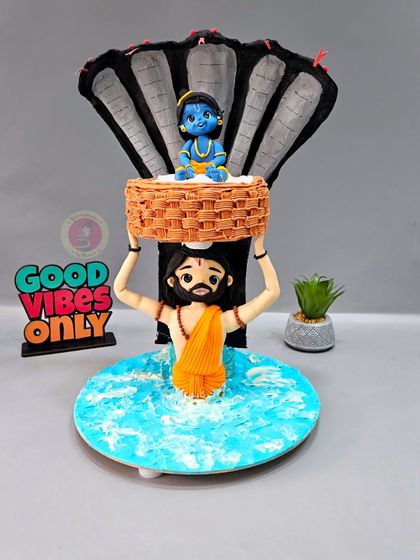 One of my most divine creations, this anti-gravity cake depicts Vasudeva carrying baby Krishna across the Yamuna. It's a tribute crafted with complete devotion and structural precision.