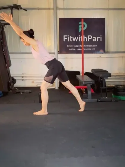 A standing single-leg reach, a great bodyweight exercise for balance and hamstring flexibility. It mimics the single-leg deadlift motion without weights.