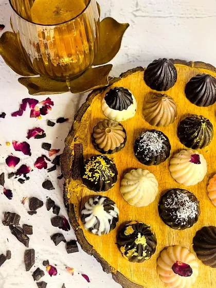 Another view of our assorted chocolate modaks, showcasing the different designs and toppings. They are a perfect blend of tradition and modern dessert artistry for the Ganpati festival.
