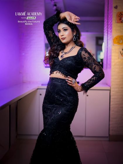 A full-length shot that captures the elegance and drama of this black-tie event look.