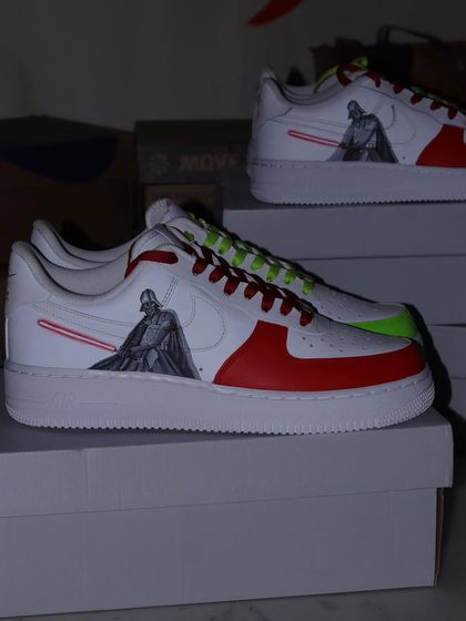 A pair of the Darth Vader custom sneakers. I used a bold red and white color-blocking design to represent the dark side, with Vader and his red lightsaber as the centerpiece.
