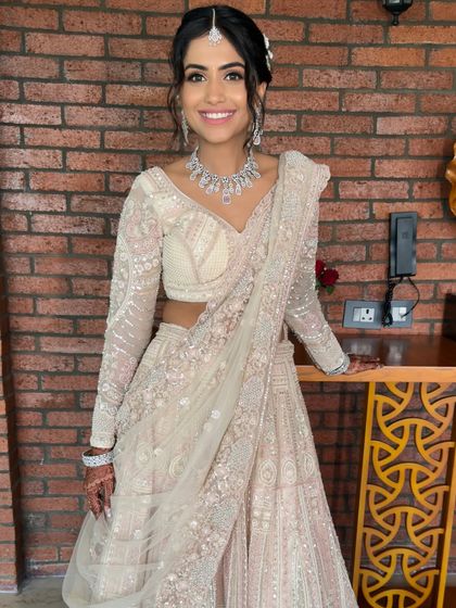 A full-length shot capturing the elegance and glamour of the entire reception ensemble.