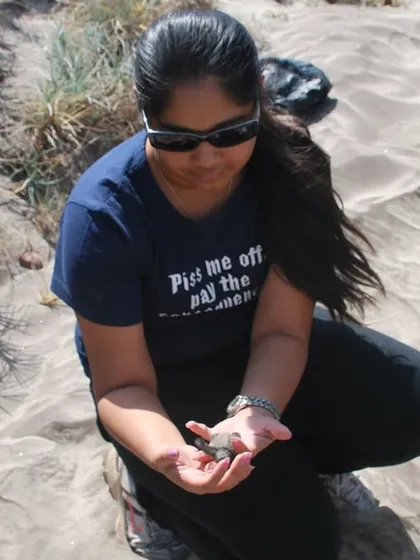 This is me in 2009, rescuing a stranded Olive Ridley hatchling and guiding it towards the sea. This early experience solidified my commitment to hands-on conservation and ethical wildlife interaction.