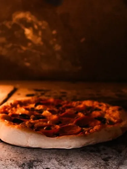 Our wood-fired pizza oven in action, delivering authentic, rustic pizzas with a perfectly crisp crust. This live station is perfect for a more relaxed event vibe and is always a hit with guests of all ages.